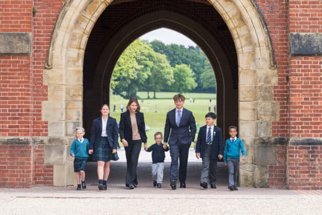Photo of all different aged students at Ardingly College in the Archway