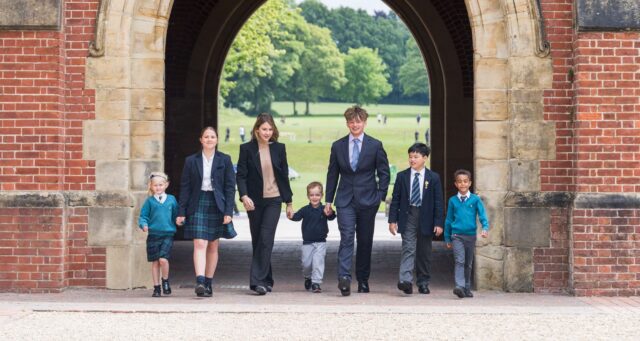 Photo of all different aged students at Ardingly College in the Archway