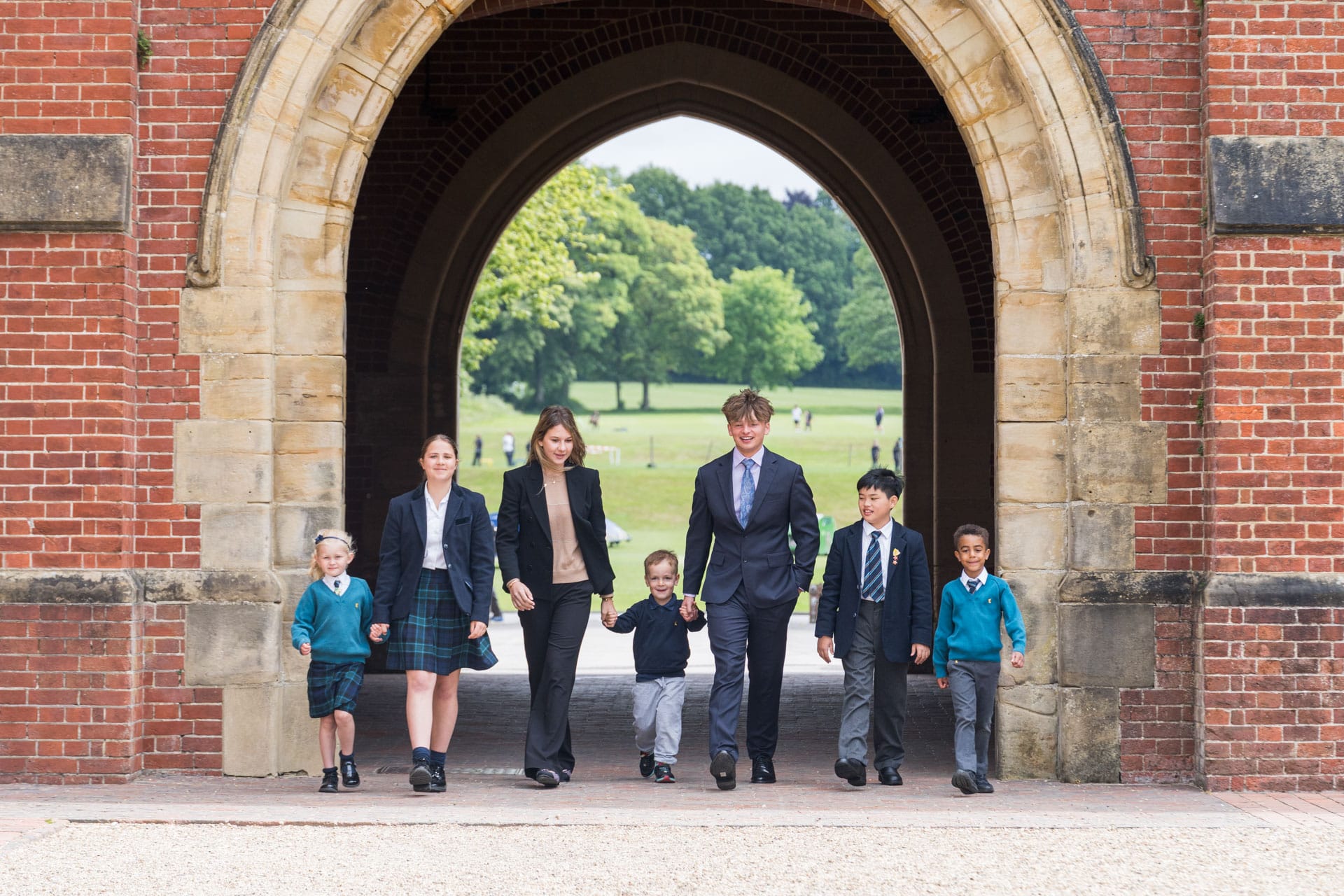 Photo of all different aged students at Ardingly College in the Archway