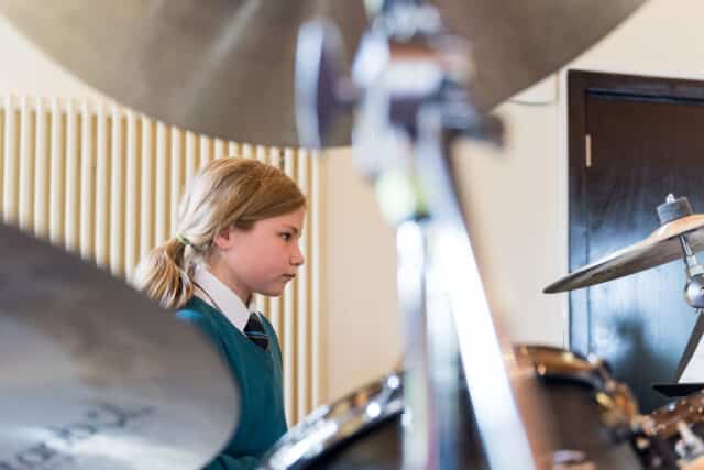 Ardingly Prep girl playing the drums