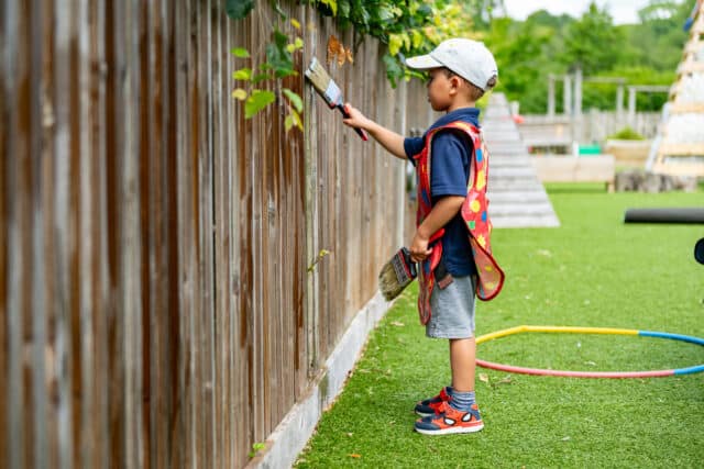 nursery child painting fence