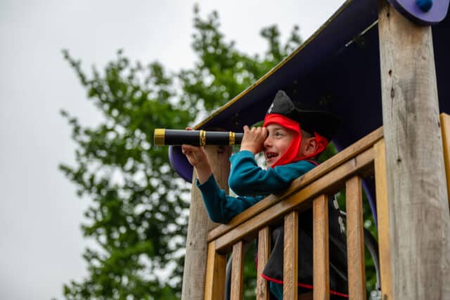 Child dressed as a pirate in the playground