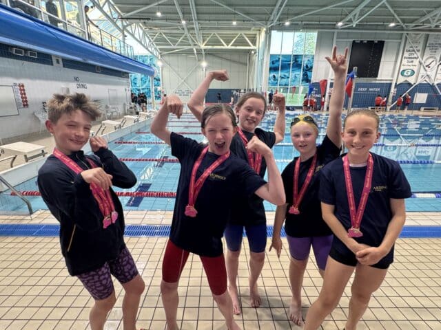 Prep swimmers at the biathlon regional finals