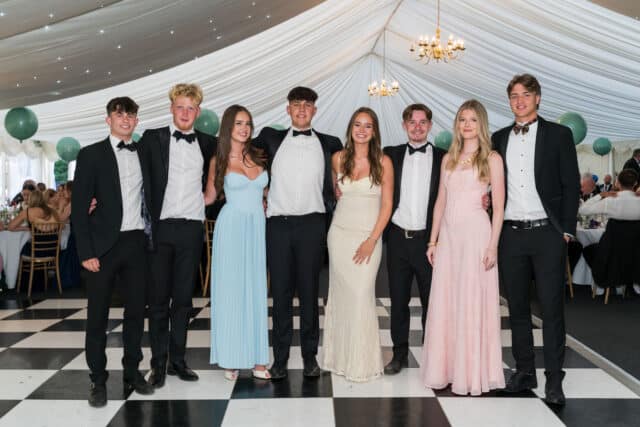 A group of Upper Sixth students all dressed up at their leavers ball 2025