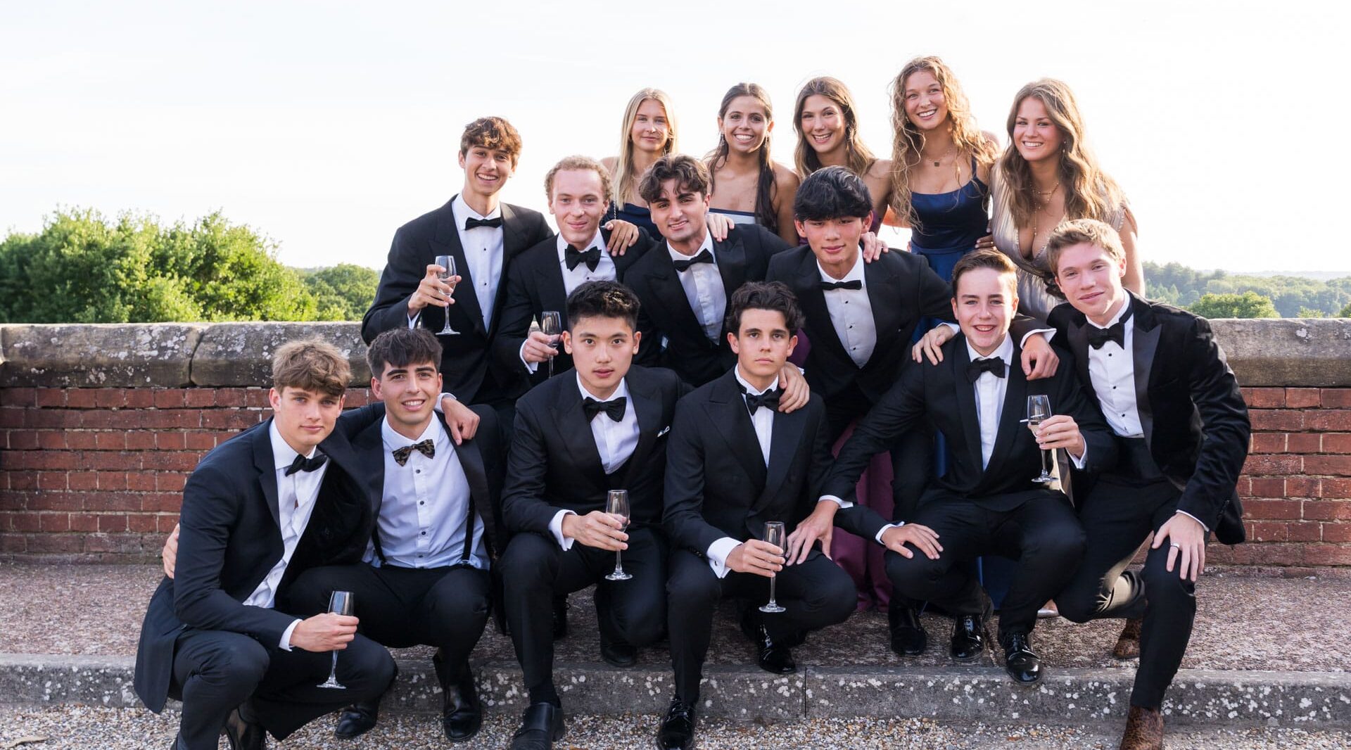 Gents at the 2025 leavers ball in their DJ's with a few of the girls joining the shot