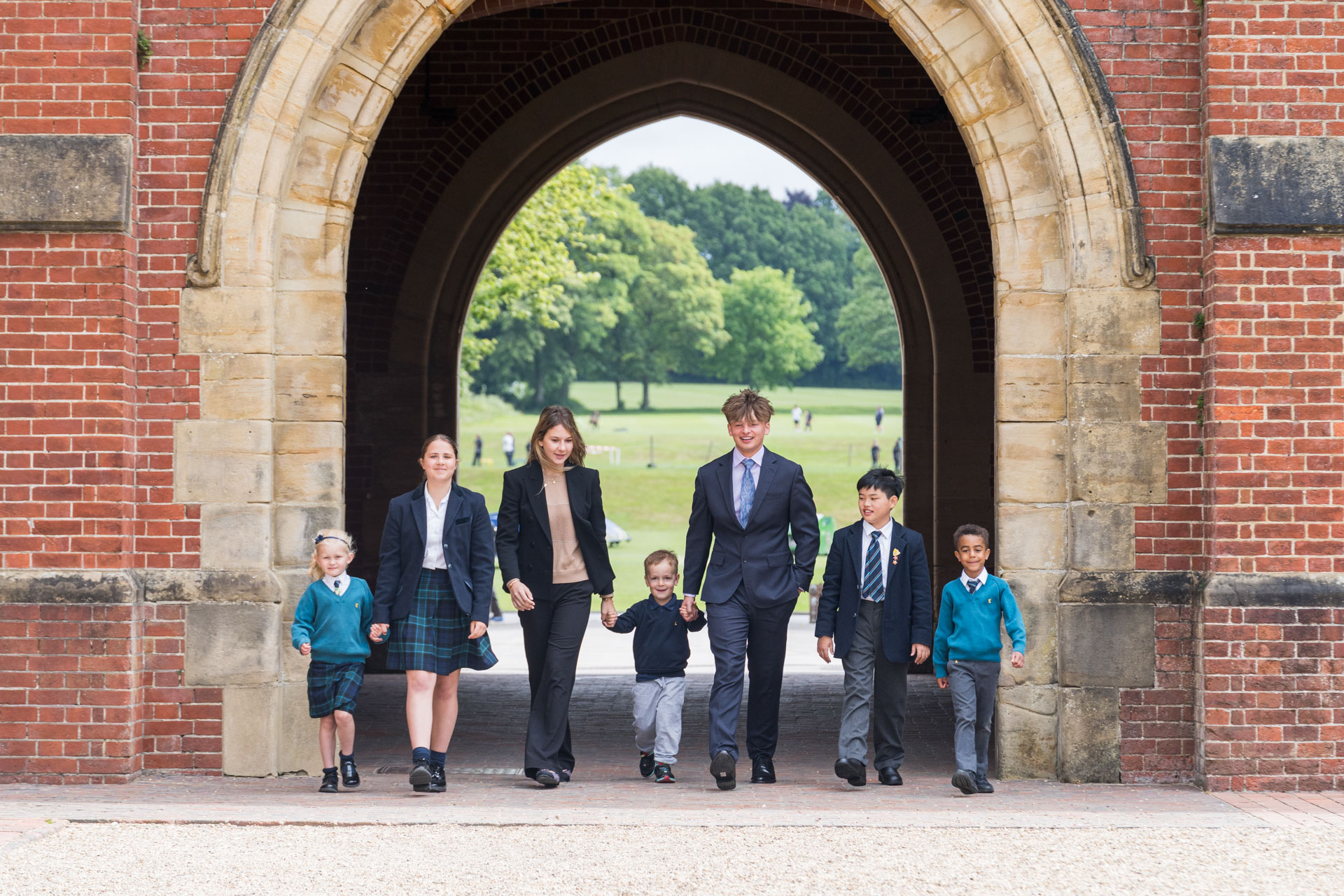 Students from every Key Stage at Ardingly College under the iconic archway.