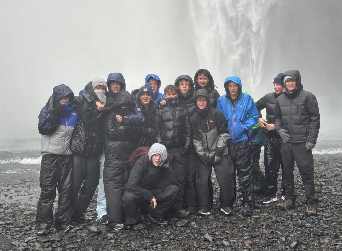 Ardingly Students in Iceland in front of a Waterfall