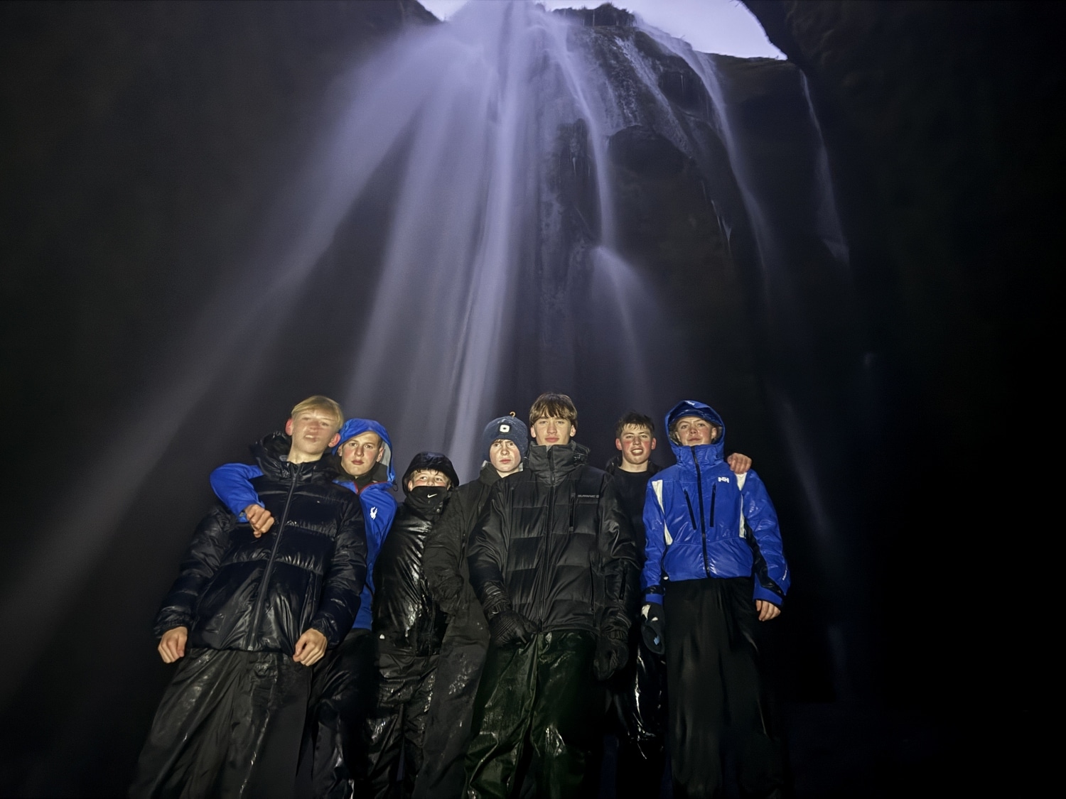 Ardingly students in the dark in a cave in Iceland