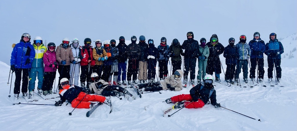 School ski trip group of students and staff
