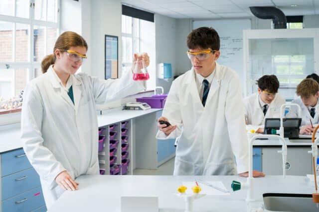 Sixth Form Students working out an experiment on Chemistry Day.