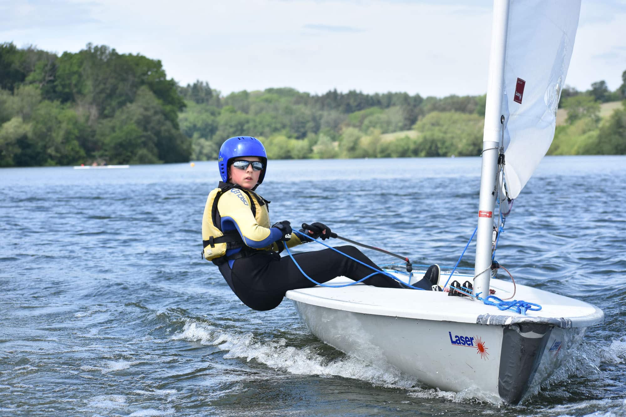 A student sailing on the Ardingly Reservoir